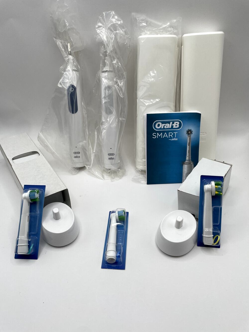 Oral-B Smart Electric Toothbrush Lot 2 Handles 2 Chargers 2 Cases 3 Brush Heads